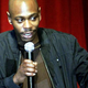 Dave Chappelle speaks to students in Washington, D.C., in 2006. (Joshua Roberts/Getty Images)